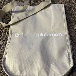 Lululemon Gray Tote Bag, and one red bag and a  green one and one blue one